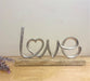 Metal Silver Love Ornament On A Wooden Base - Kozeenest